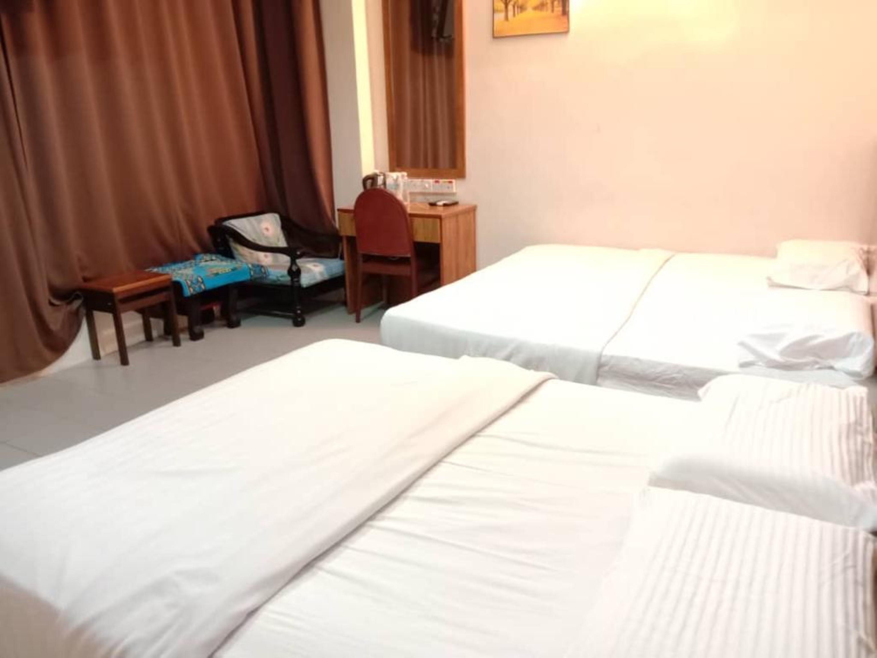 Oyo 89877 Sun Triang Hotel Kampong Kerayong Kültér fotó