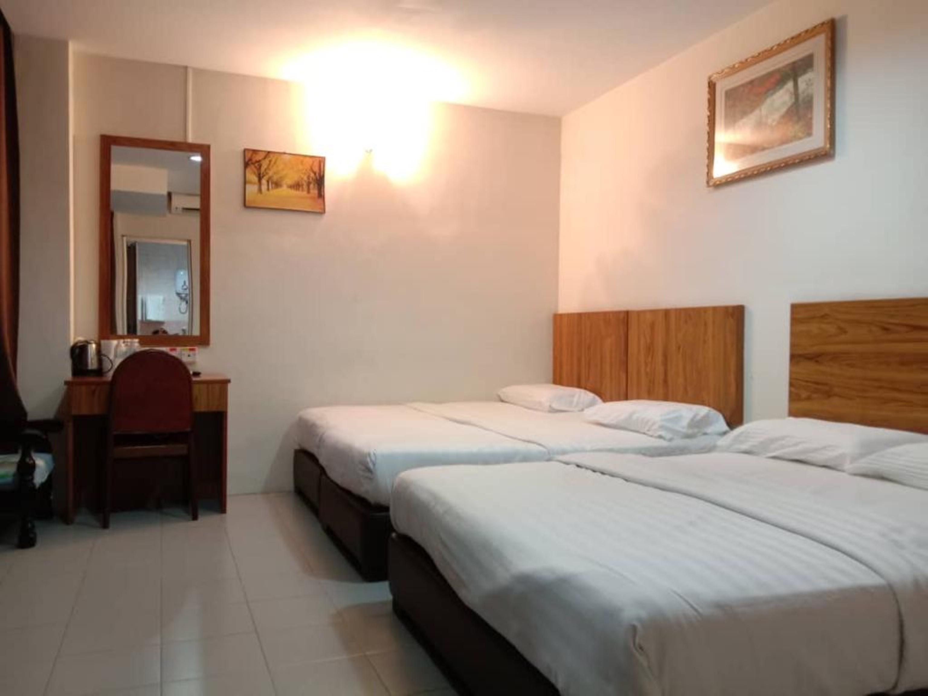Oyo 89877 Sun Triang Hotel Kampong Kerayong Kültér fotó