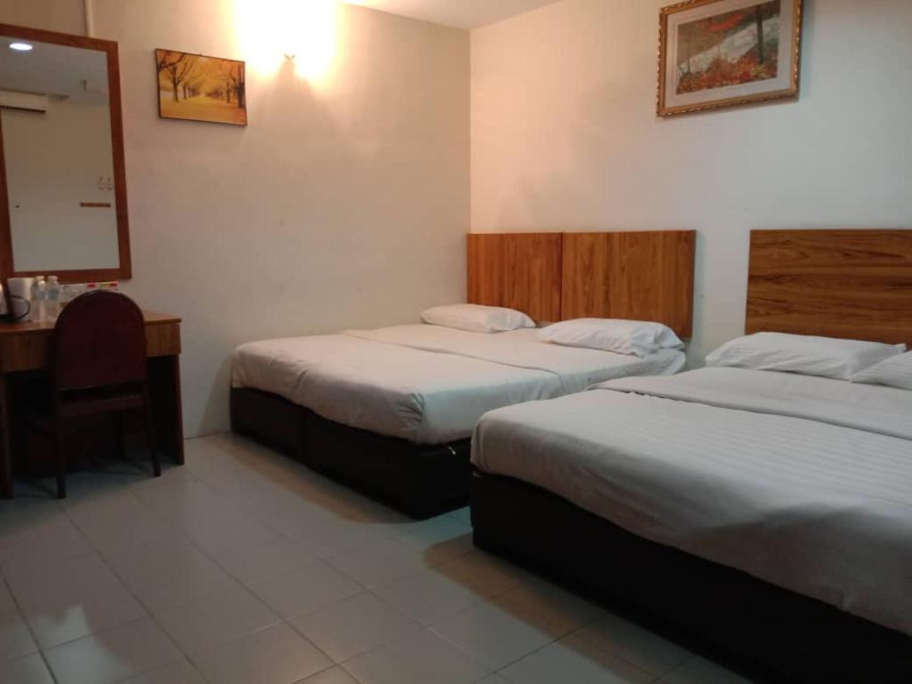 Oyo 89877 Sun Triang Hotel Kampong Kerayong Kültér fotó